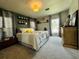 Comfortable bedroom with carpet and light-filled windows at 808 53Rd E Ave # 142K, Bradenton, FL 34203