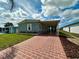 Attractive home with a spacious covered patio and brick driveway at 808 53Rd E Ave # 142K, Bradenton, FL 34203