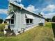 Charming home with white trim and lush landscaping at 808 53Rd E Ave # 142K, Bradenton, FL 34203