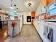 Modern kitchen with white cabinetry, tile flooring, and contemporary appliances creating a functional space at 808 53Rd E Ave # 142K, Bradenton, FL 34203