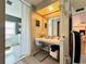 A vanity area with a desk and a mirror in the hall at 808 53Rd E Ave # 142K, Bradenton, FL 34203