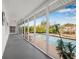 The screened patio overlooks the pool and canal creating a tranquil space at 8727 Bay Crest Ln, Tampa, FL 33615
