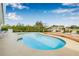A pristine pool with a deck for waterfront relaxation and outdoor dining at 8727 Bay Crest Ln, Tampa, FL 33615