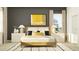 Beautifully staged bedroom featuring stylish decor, a modern bed frame, and coordinating nightstands at 9590 Runaway Breeze Dr, Land O Lakes, FL 34637
