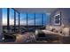 Serene main bedroom showcasing floor-to-ceiling windows with a city view and elegant modern decor at 1101 E Jackson St # 2008, Tampa, FL 33602