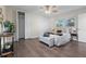 Cozy bedroom with ample closet space, a ceiling fan, and neutral decor for a relaxing atmosphere at 1105 Oakview Ave, Clearwater, FL 33756