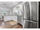 A stylish kitchen showcases granite countertops, stainless steel appliances, and wood-look flooring at 1105 Oakview Ave, Clearwater, FL 33756