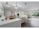 Bright living room with modern decor, hardwood floors, and sliding glass doors to the yard at 1105 Oakview Ave, Clearwater, FL 33756