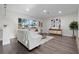 Comfortable living room with stylish furniture, a woven rug, and a bright window at 1105 Oakview Ave, Clearwater, FL 33756
