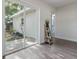 Bright room features sliding glass doors leading to outdoor patio, and decor ladder at 1105 Oakview Ave, Clearwater, FL 33756