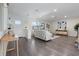 Inviting living room with hardwood floors, modern furniture, and ample natural light at 1105 Oakview Ave, Clearwater, FL 33756