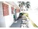 Patio with table and chairs in the backyard at 12400 Park Blvd # 111, Seminole, FL 33772