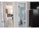 Bathroom with shower, toilet, and a sink, offering a clean aesthetic at 12400 Park Blvd # 111, Seminole, FL 33772