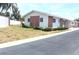 Charming single-story home with brick accents, manicured shrubs, and a well-maintained landscape at 12400 Park Blvd # 111, Seminole, FL 33772