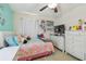 Cozy bedroom with colorful decorations and plenty of storage space, perfect for a room or guest room at 12531 Midpointe Dr, Riverview, FL 33578