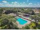 Inviting community pool with a sundeck and seating area, perfect for relaxation and recreation at 12531 Midpointe Dr, Riverview, FL 33578