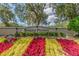 Entrance sign for South Pointe community with colorful flower beds in foreground at 12531 Midpointe Dr, Riverview, FL 33578