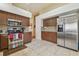 Spacious kitchen with modern appliances, ample counter space, and stylish tile flooring at 12531 Midpointe Dr, Riverview, FL 33578