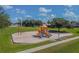 Neighborhood playground featuring modern play structures in a Gathering-friendly community park setting at 12531 Midpointe Dr, Riverview, FL 33578