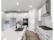 Bright kitchen with white cabinets, modern appliances, and a stylish island at 1311 S Moody Ave # 1, Tampa, FL 33629