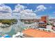 High angle view of the channel and harbor, showing the neighborhood, boats, and surrounding area at 13235 Gulf Blvd # 502, Madeira Beach, FL 33708