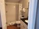 Clean bathroom with a walk-in shower, tile floor, and updated vanity at 13235 Gulf Blvd # 502, Madeira Beach, FL 33708