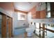 A partially renovated bathroom with a bathtub and a window at 13305 Sunfish Dr, Hudson, FL 34667