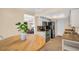 Bright kitchen featuring a breakfast nook and ample counter space with black appliances at 1353 Camelot Ct, Palm Harbor, FL 34684