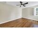 Spacious bedroom with wood-look floors and lots of natural light at 13785 Oak Forest S Blvd, Seminole, FL 33776