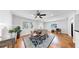 Bright dining room featuring a ceiling fan, a blue patterned rug, and lots of natural light at 1402 Freemont S St, Gulfport, FL 33707
