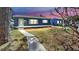 Charming single-story home with a well-maintained lawn and inviting walkway to front door at 1402 Freemont S St, Gulfport, FL 33707