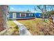 Charming single story home with a walkway leading to the front door at 1402 Freemont S St, Gulfport, FL 33707