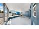 Screened lanai with seating area and natural light at 1402 Freemont S St, Gulfport, FL 33707
