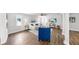 Living room with wood floors, white walls, comfortable seating, and a ceiling fan at 1402 Freemont S St, Gulfport, FL 33707