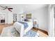 Beautiful main bedroom with stylish decor, ceiling fan, and wood flooring at 1402 Freemont S St, Gulfport, FL 33707