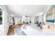 Expansive main bedroom suite with wood floors, and a big window perfect for relaxing at 1402 Freemont S St, Gulfport, FL 33707