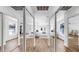 Bright main bedroom features modern decor and mirrored closet doors at 1402 Freemont S St, Gulfport, FL 33707