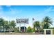 Welcome to Gulfport sign with palm trees and clear blue sky at 1402 Freemont S St, Gulfport, FL 33707