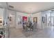 Elegant dining room featuring modern chandelier, stylish table setting, and sophisticated decor for luxury at 16106 Cedar Key Dr, Wimauma, FL 33598