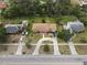 An aerial view shows a residential property with a distinctive driveway and well-maintained landscaping at 1710 26Th S Ave, St Petersburg, FL 33712