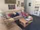 Cozy living room featuring a comfortable sofa, colorful decor and built in shelving at 1710 26Th S Ave, St Petersburg, FL 33712