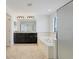 Bright bathroom features a soaking tub, granite countertops, and stylish fixtures at 1830 Nature View Dr, Lutz, FL 33558