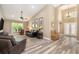 Spacious living room features beautiful floors, high ceilings, and an abundance of natural light at 18819 Rue Loire St, Lutz, FL 33558