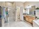 Bathroom with a glass door shower, a vanity with granite countertops, and a toilet at 1939 Heartland Cir, Valrico, FL 33594