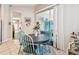 Cozy breakfast nook featuring a round table, four chairs, and natural light from a sliding glass door at 1939 Heartland Cir, Valrico, FL 33594