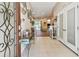 Inviting entryway with tile flooring, white trim, and lots of natural light at 1939 Heartland Cir, Valrico, FL 33594