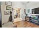 Another view of the office shows the hardwood floors and connection to another room at 1939 Heartland Cir, Valrico, FL 33594