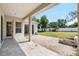 Covered patio with brick pavers and outdoor firepit, providing an ideal space for entertaining and relaxation at 2019 Rutherford Dr, Dover, FL 33527