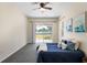 Bedroom featuring a sliding glass door that leads to the backyard at 2019 Rutherford Dr, Dover, FL 33527