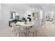 Bright dining area with a modern marble table, stylish seating, and elegant decor at 202 S Lincoln Ave, Tampa, FL 33609